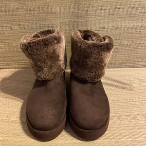 Uggs boots, fur on outside with buckler NWOT